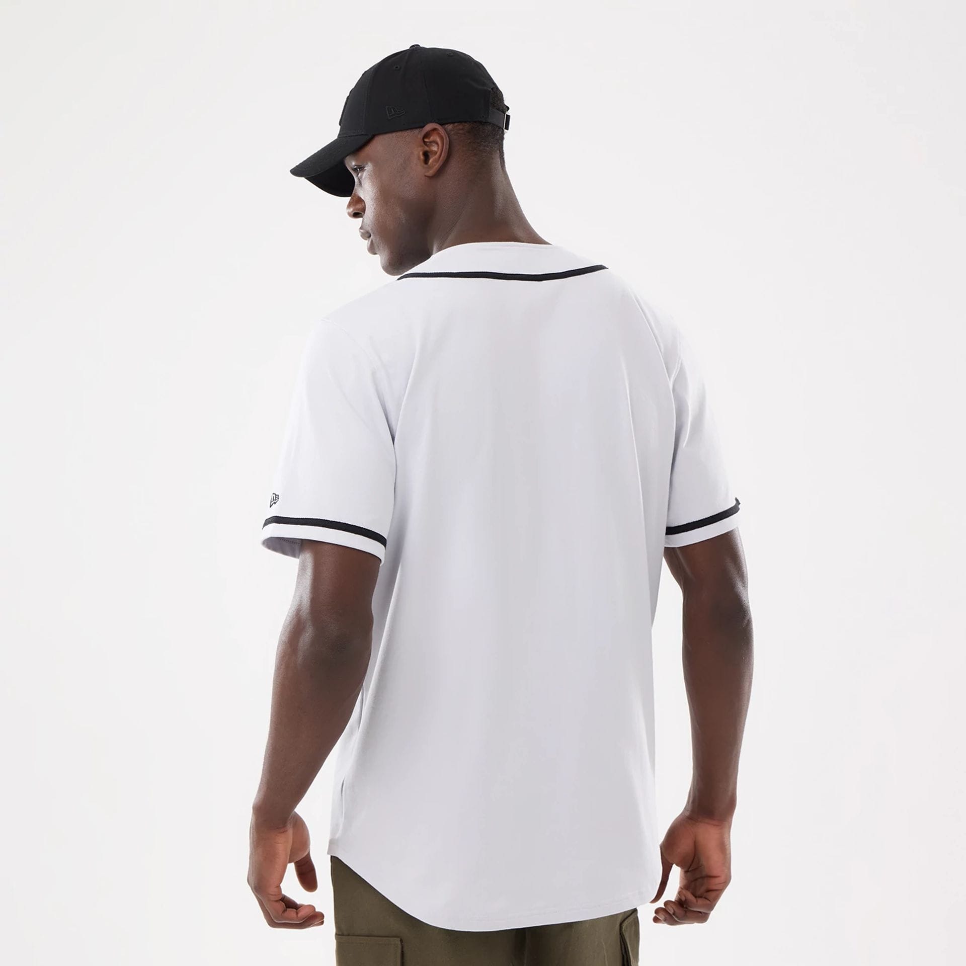 The model is wearing this New Era Basic Jersey in white. 2