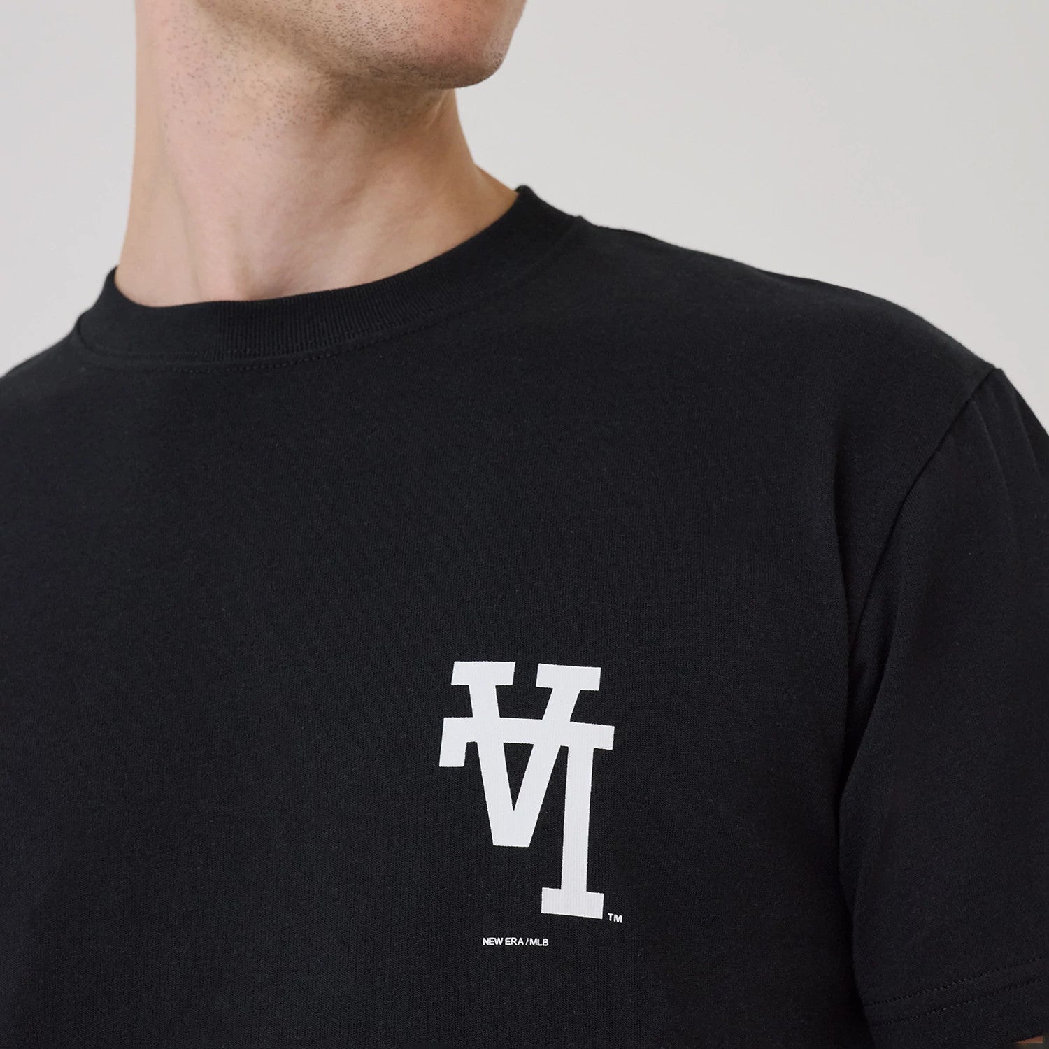 The model is wearing this MLB Upside Down LA Dodgers T-Shirt in black. 3