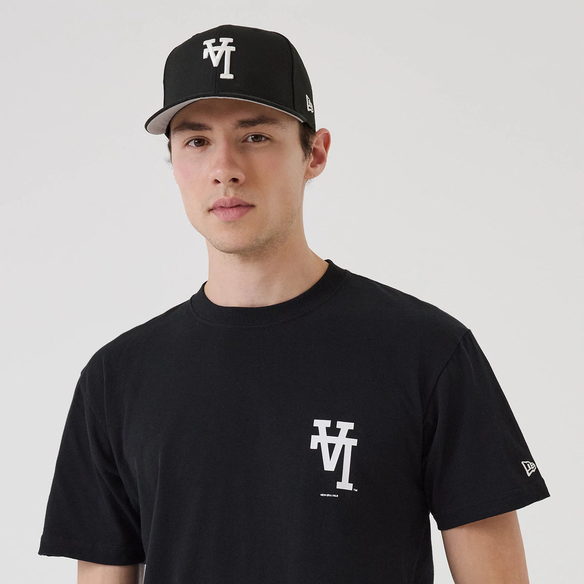 The model is wearing this MLB Upside Down LA Dodgers T-Shirt in black. 7