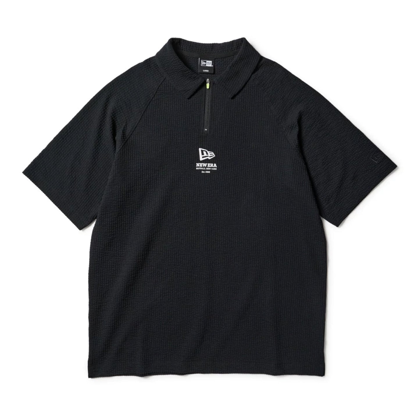 The model is wearing this New Era Seersucker Polo T-Shirt in black. 7