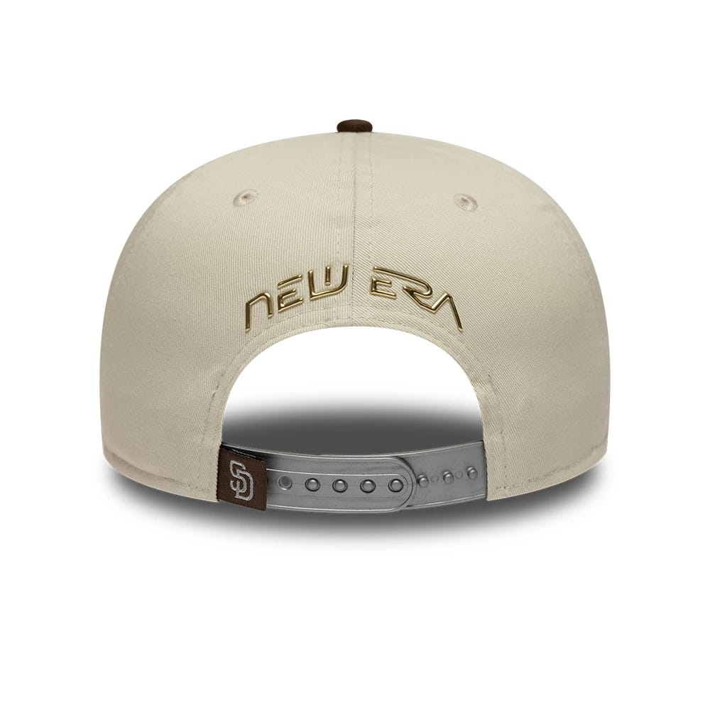 San Diego Padres Hajime Sorayama X MLB Cream Retro Crown New Era 9FIFTY Adjustable Cap, rear view showing the gold New Era lettering embroidered above the grey adjustable strap and SD logo on the brown strap button.