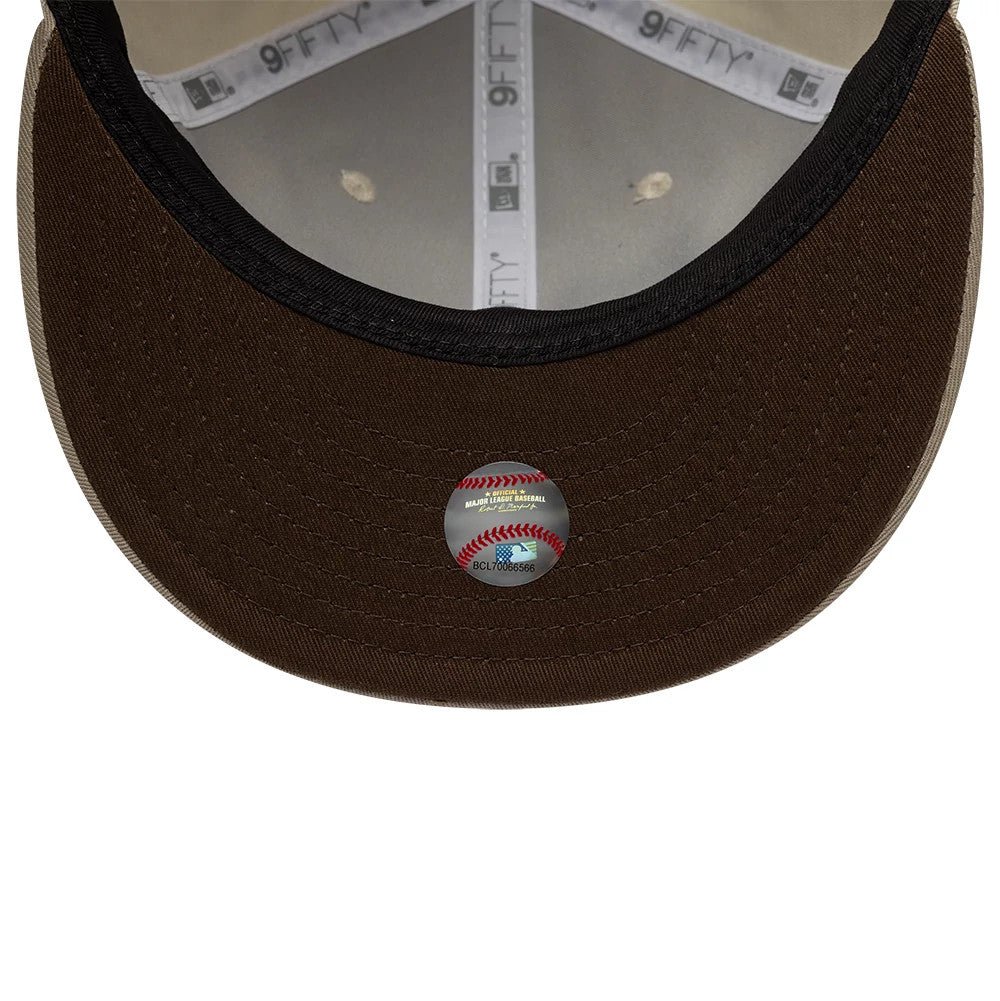Pictured is this Hajime Sorayama X MLB San Diego Padres Retro Crown 9FIFTY cap in Cream. 2