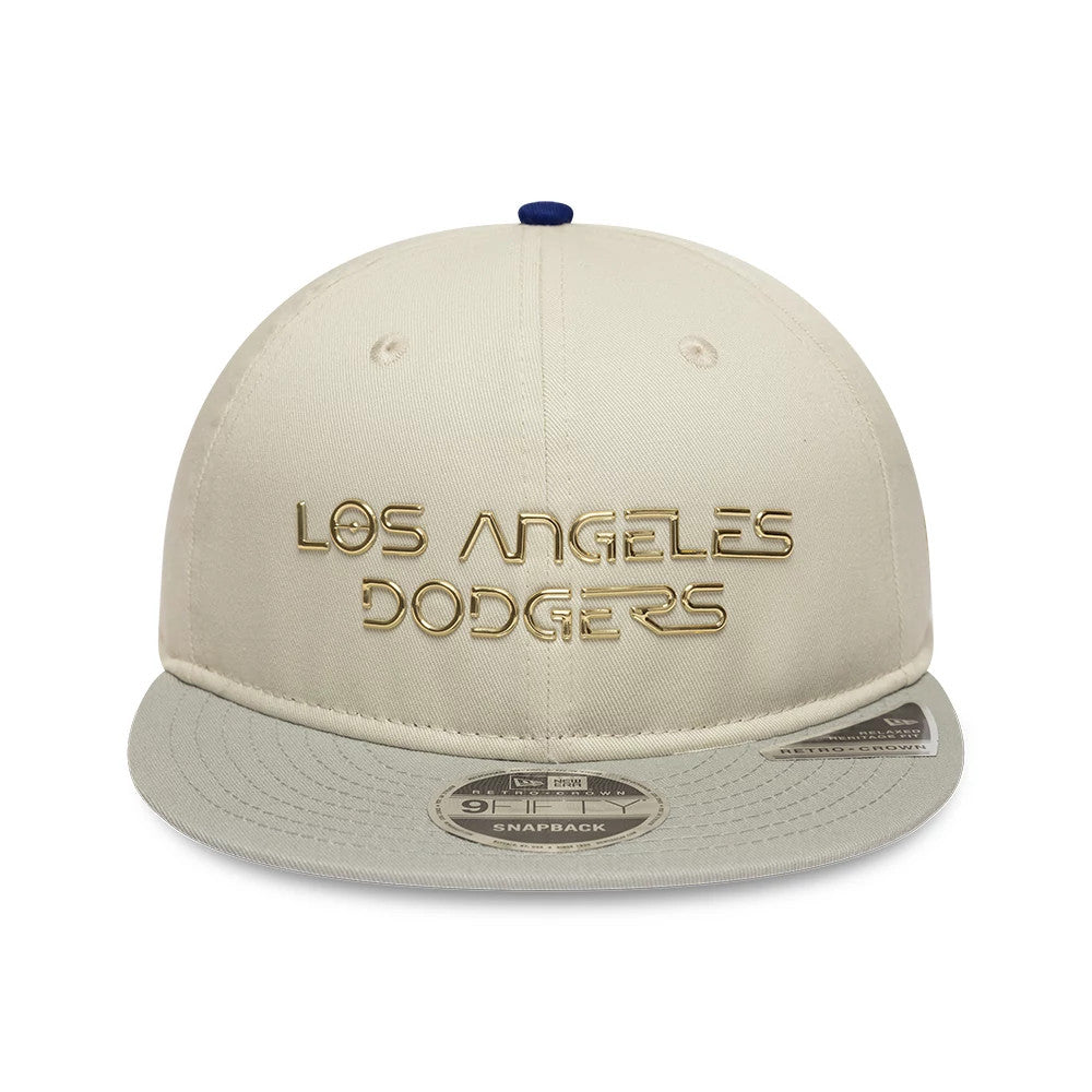 LA Dodgers Hajime Sorayama X MLB Cream Retro Crown New Era 9FIFTY Adjustable Cap, front view showing raised gold Los Angeles Dodgers lettering on the structured cream crown, with 9FIFTY size sticker on the flat grey visor.