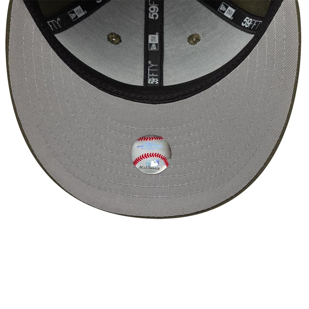 Seattle Mariners MLB College Varsity Dark Green Low Profile New Era 59FIFTY Fitted Cap, inside view showing grey taping and sweatband, with a baseball sticker on the underside of the grey undervisor, and contrasting stitching details.