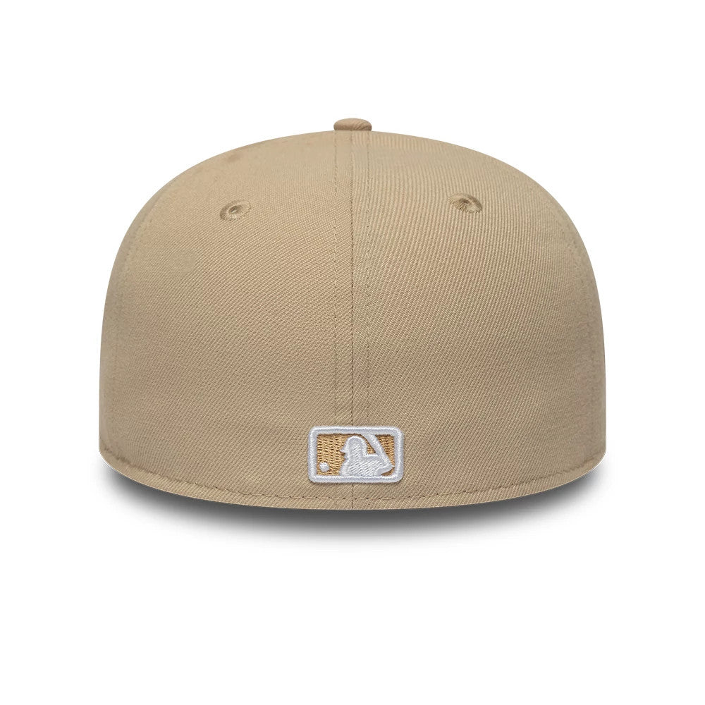 New York Yankees MLB College Varsity Beige Low Profile New Era 59FIFTY Fitted Cap, rear view showing the white and beige embroidered MLB Batterman logo at the centre of the back panels on a beige structured crown.