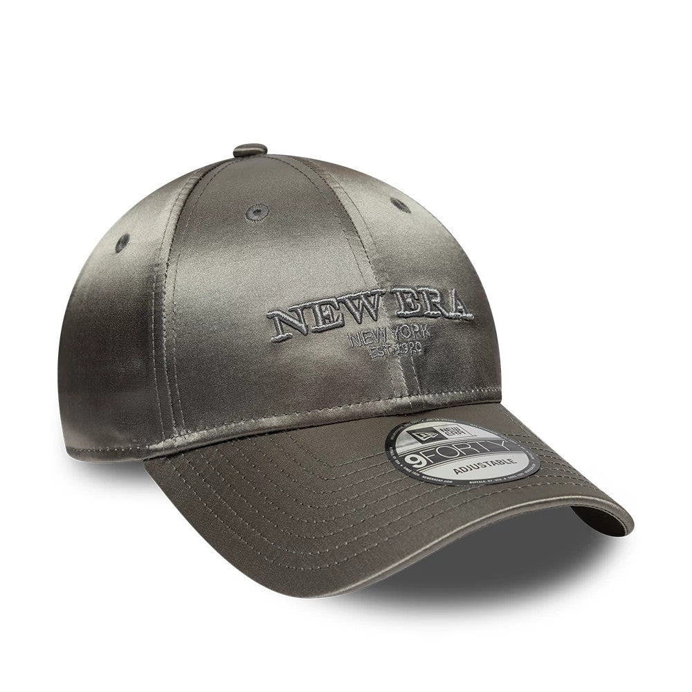 New Era Satin Grey 9FORTY Adjustable Cap, three-quarter view with raised grey front New Era logo embroidery, grey curved visor and 9FORTY size sticker, highlighting the sleek satin finish and structured crown.