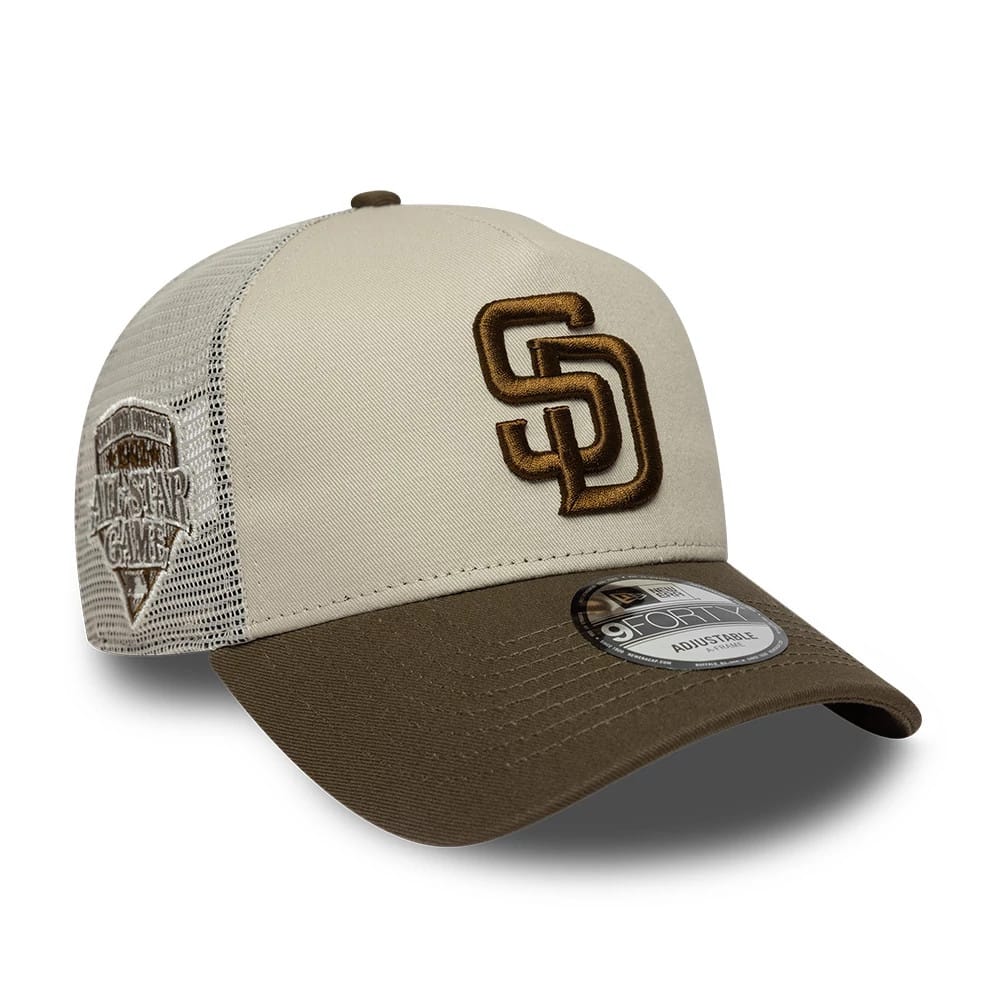 Pictured is this MLB Patch San Diego Padres 9FORTY A-Frame Trucker cap in light beige. 1