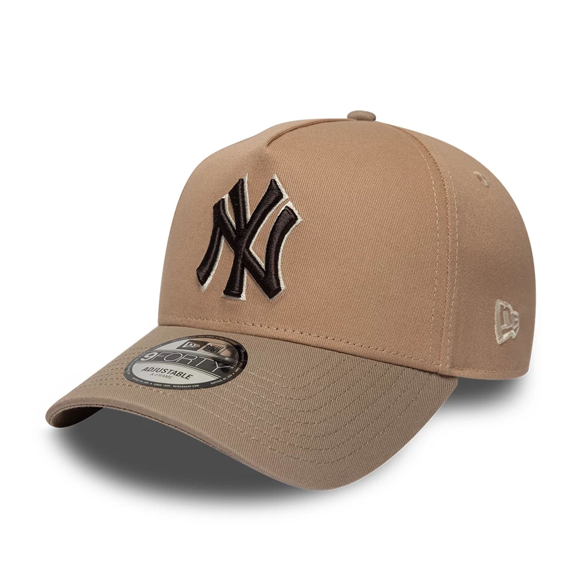 Pictured is this MLB Mocha Mousse New York Yankees 9FORTY A-Frame Adjustable cap in beige. 1