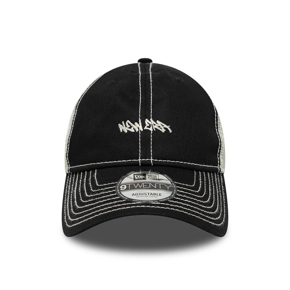 Pictured is this New Era Tagging Logo 9TWENTY Trucker cap in black. 2