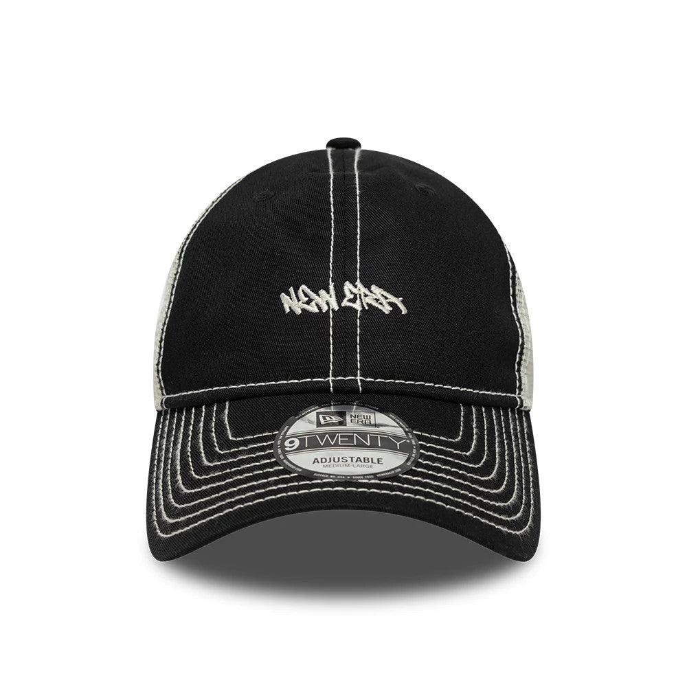 Pictured is this New Era Tagging Logo 9TWENTY Trucker cap in black. 2