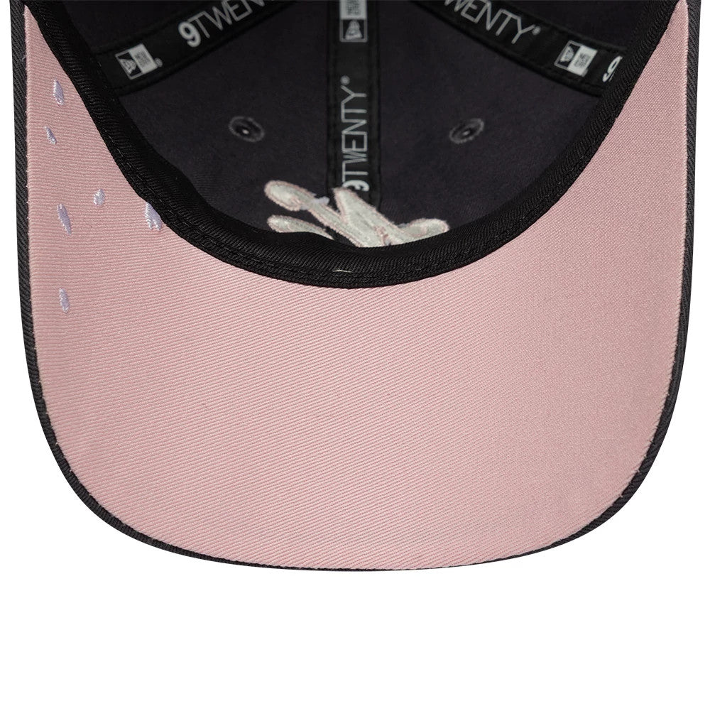 New Era Sakura Nagashi Dark Grey New Era 9TWENTY Adjustable Cap, inside view showing pink undervisor with delicate embroidered raindrop accents, black sweatband, and 9TWENTY taping along the interior crown.