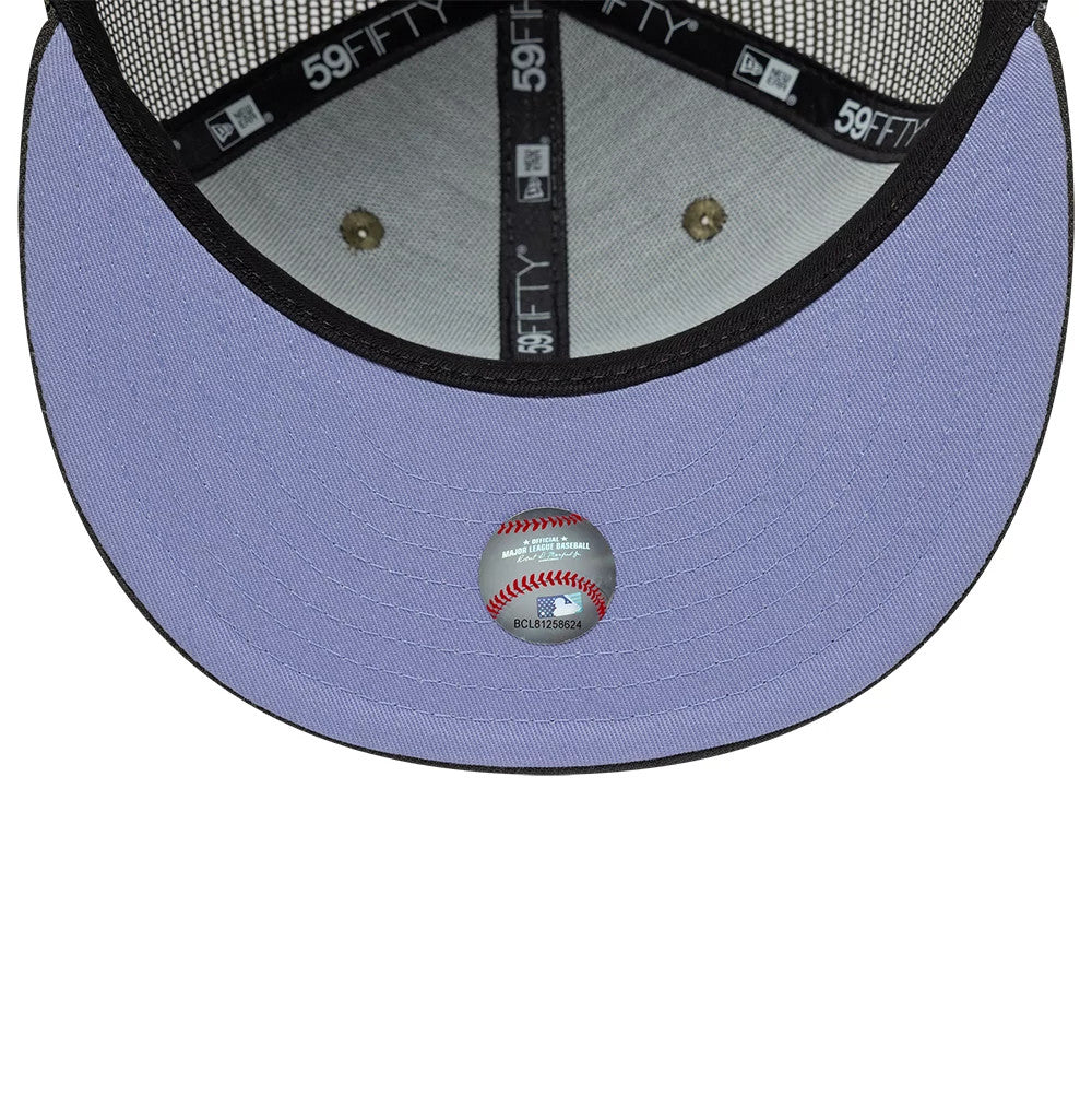 New York Yankees MLB Hydrangea Green New Era 59FIFTY Fitted Cap, inside view showing the light purple undervisor, Major League Baseball holographic sticker, and black taping with white 59FIFTY branding on the crown.