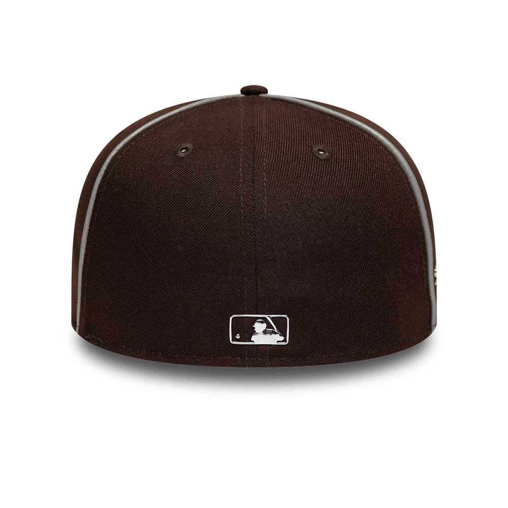 Pictured is this Hajime Sorayama X MLB San Diego Padres 59FIFTY Fitted cap in Dark Brown. 7