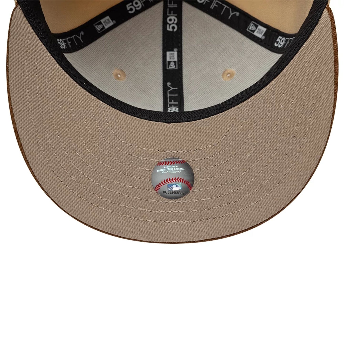 Pictured is this MLB Mocha Mousse New York Yankees 59FIFTY Fitted cap in light beige. 7