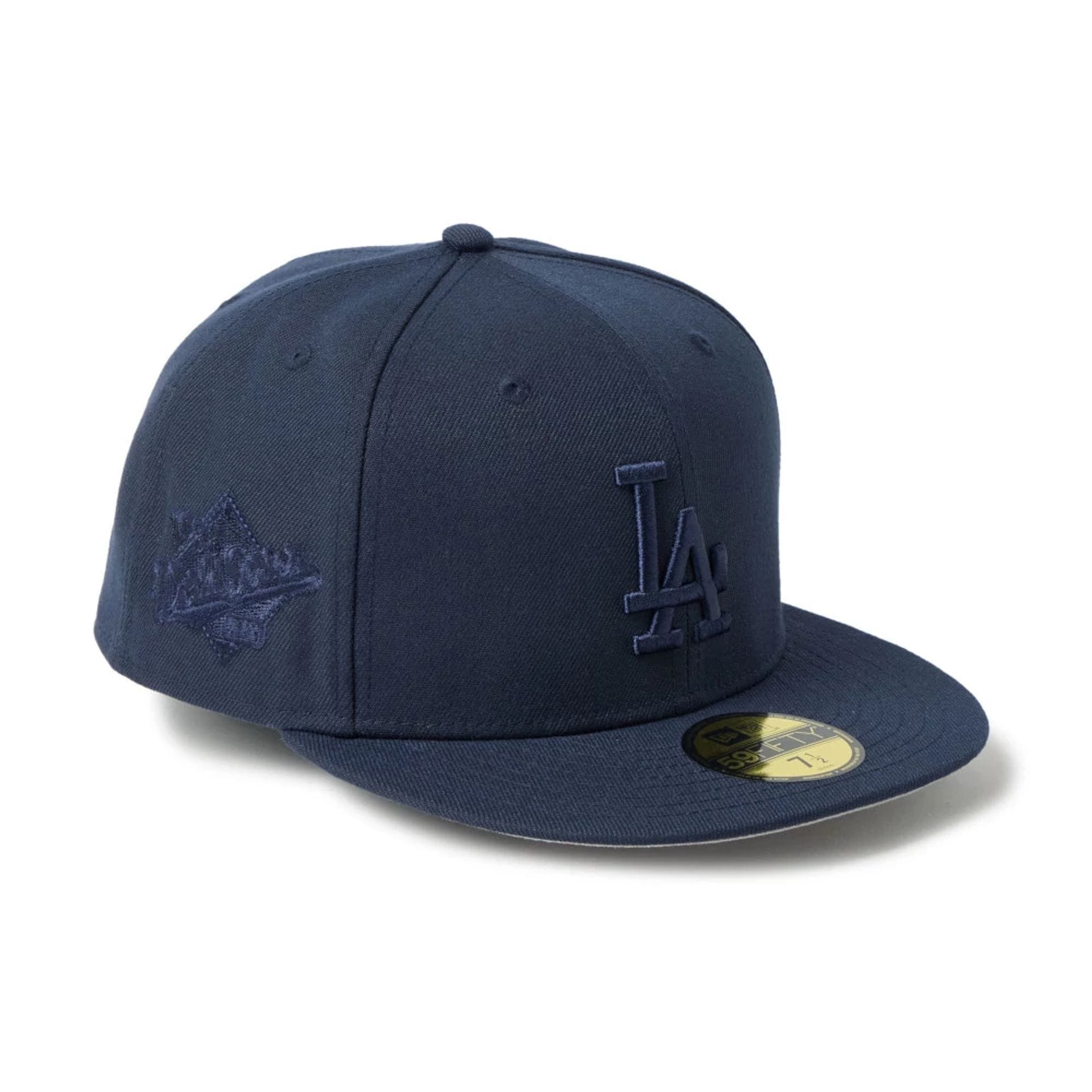 Pictured is this MLB LA Dodgers 59FIFTY Fitted cap in navy. 1