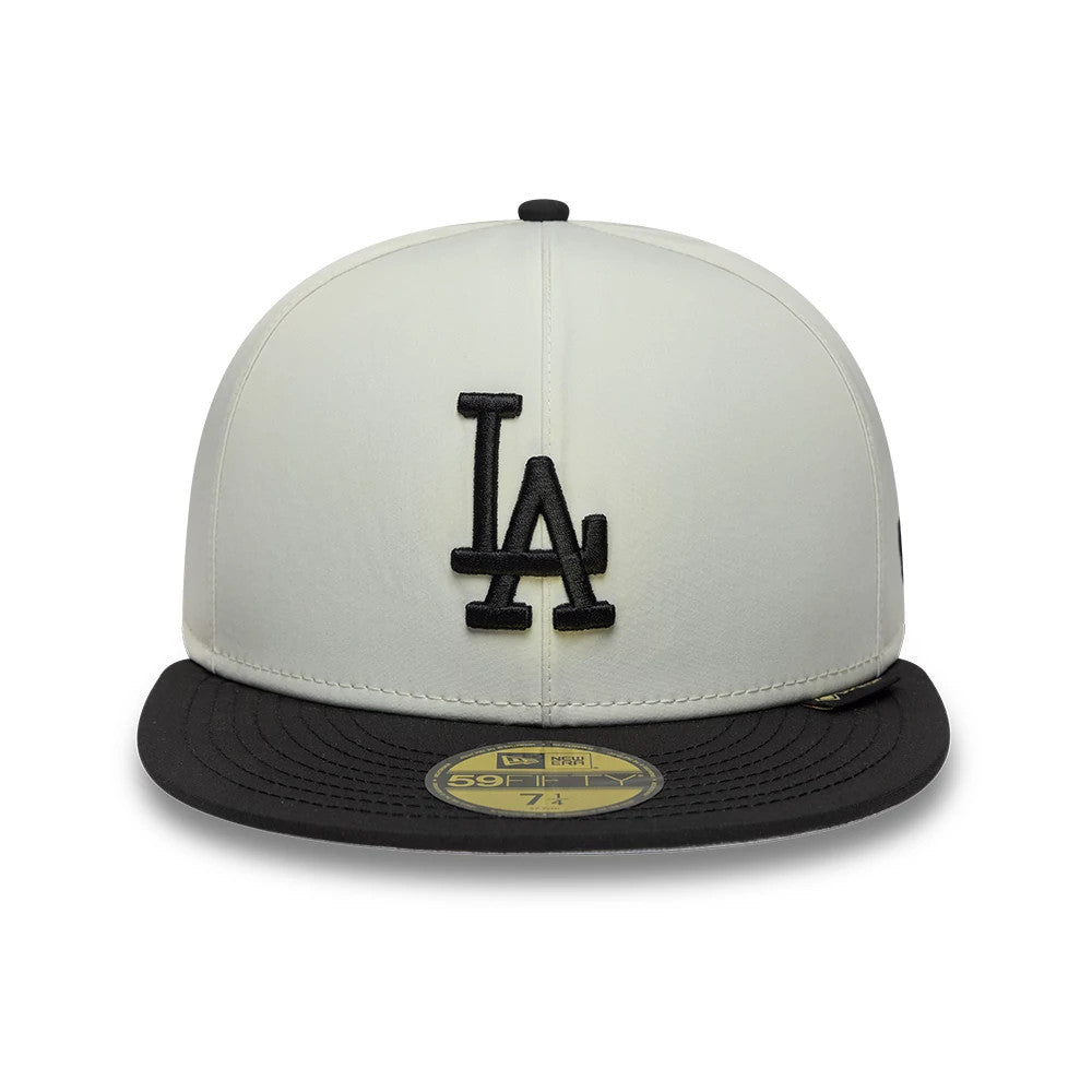 LA Dodgers MLB X Gore-Tex Black New Era 59FIFTY Fitted Cap, front view showing the raised black LA logo embroidered on the front panel, with a black flat visor featuring a gold 59FIFTY size sticker.