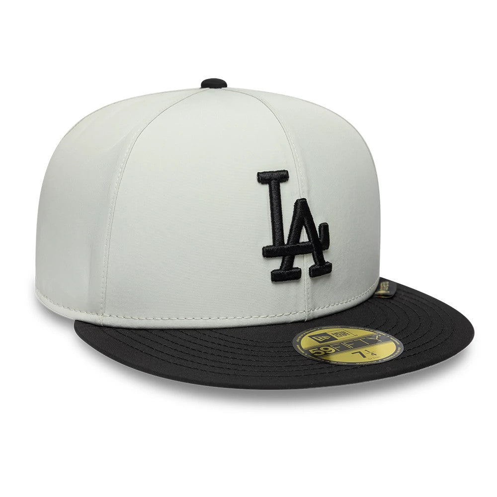 LA Dodgers MLB X Gore-Tex Black New Era 59FIFTY Fitted Cap, front view showing the black raised embroidered LA logo on the structured crown with a contrasting black visor and gold 59FIFTY size sticker.