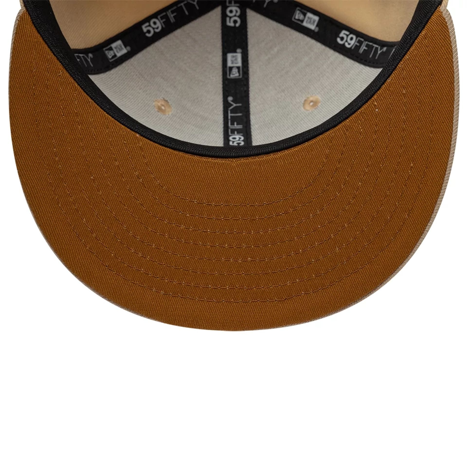 Pictured is this New Era Mocha Mousse 59FIFTY Fitted cap in light beige. 2