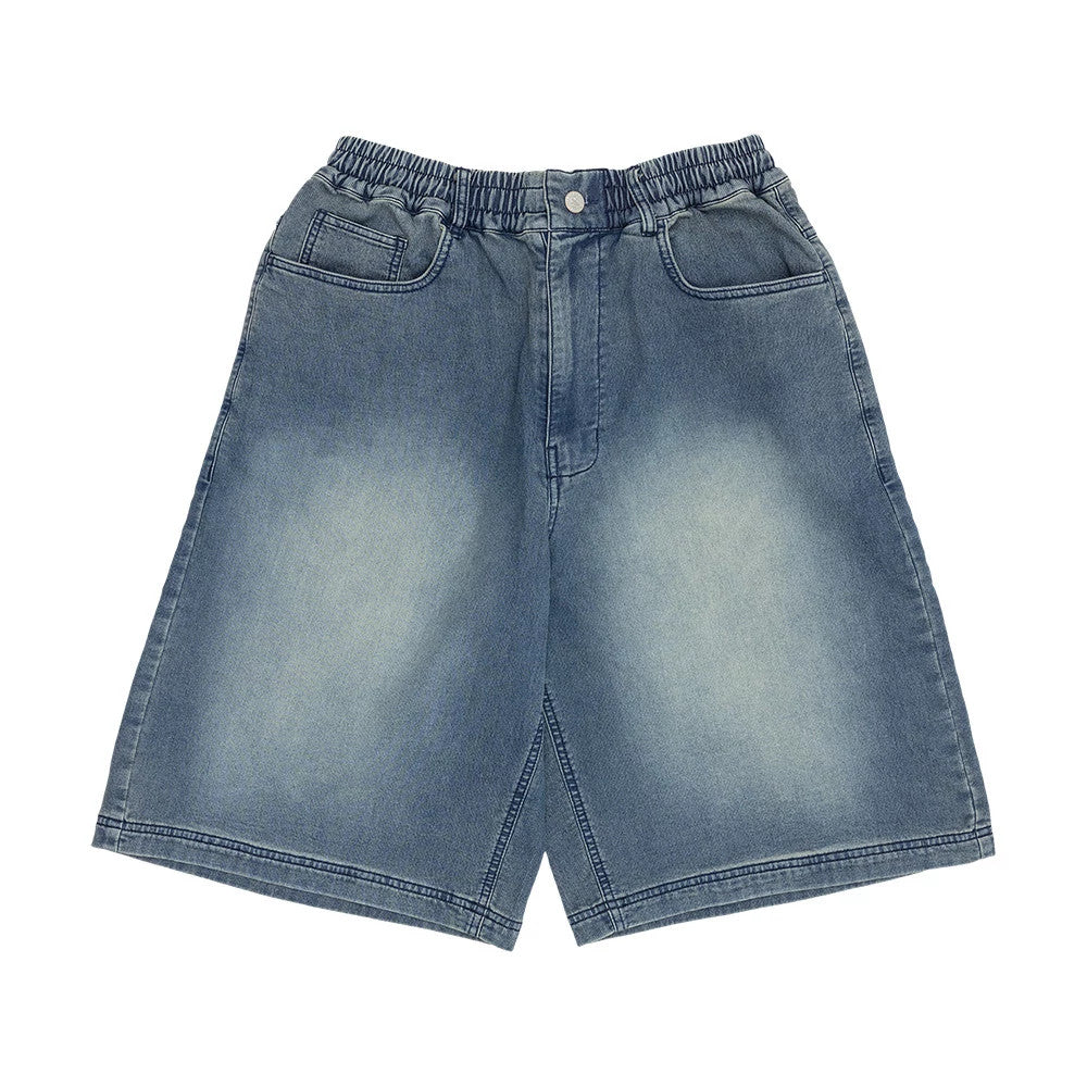 The model is wearing this New Era Washed Bermuda Shorts in blue. 7