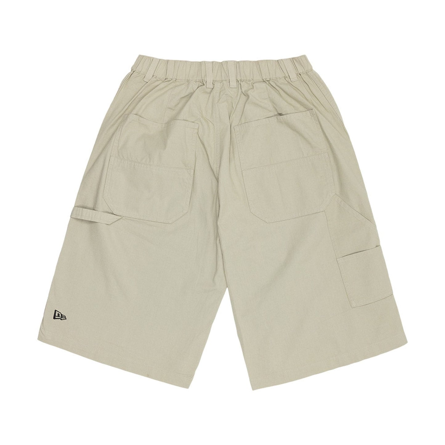 The model is wearing this New Era Canvas Bermuda Shorts in grey. 2