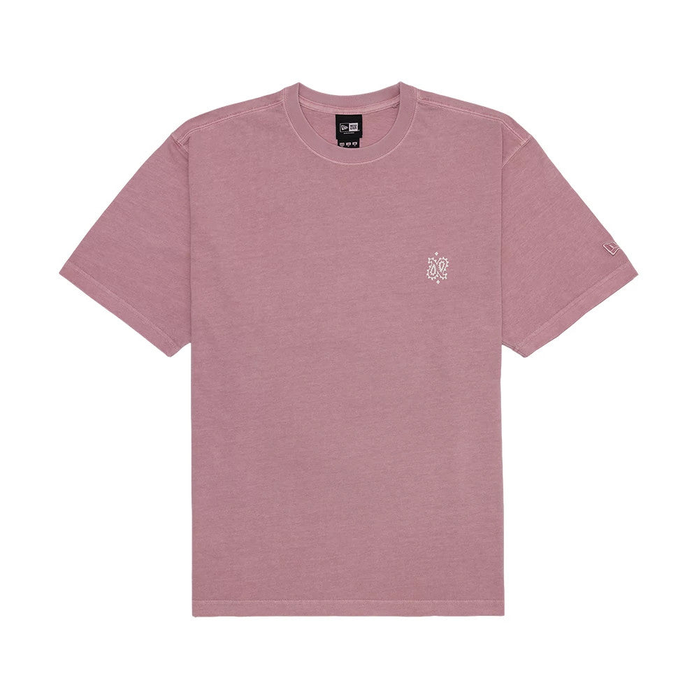 New Era Paisley Pink T-Shirt, front view showing the light pink crew neck shirt with a small white paisley pattern on the left chest and a debossed New Era logo on the left sleeve edge.