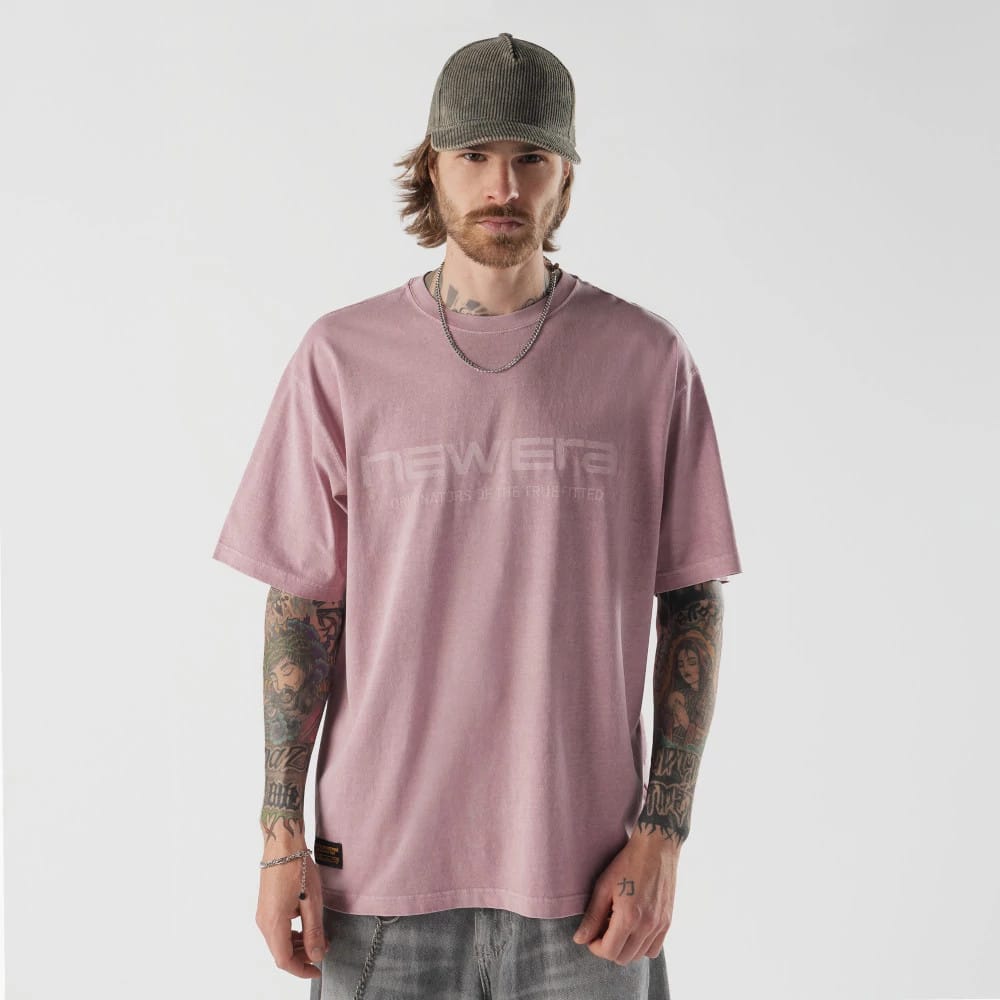 The model is wearing this New Era Originators T-Shirt in pink. 1