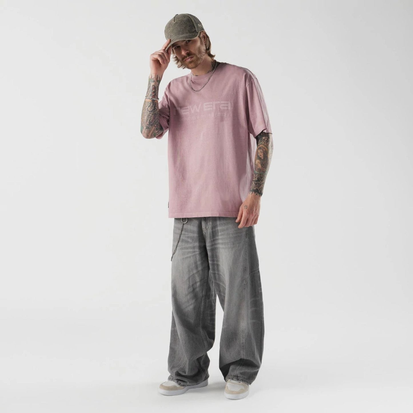 The model is wearing this New Era Originators T-Shirt in pink. 5