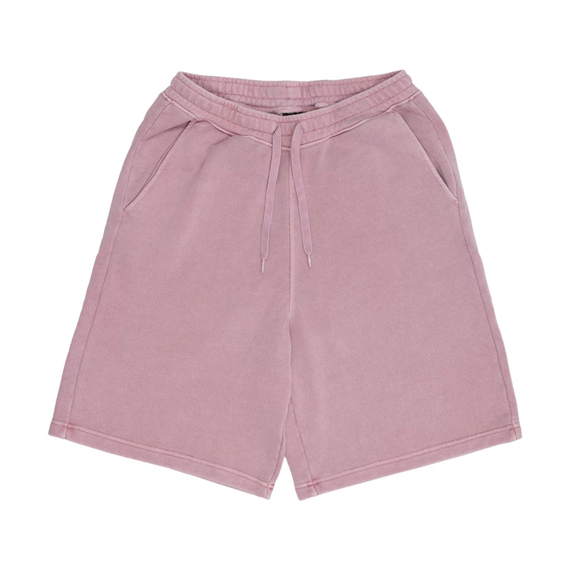 The model is wearing this New Era Originators Oversized Shorts in pink. 1