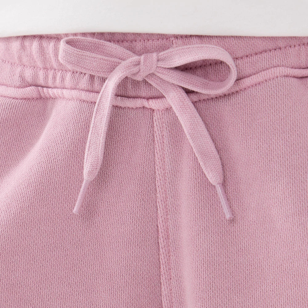 The model is wearing this New Era Originators Oversized Shorts in pink. 3