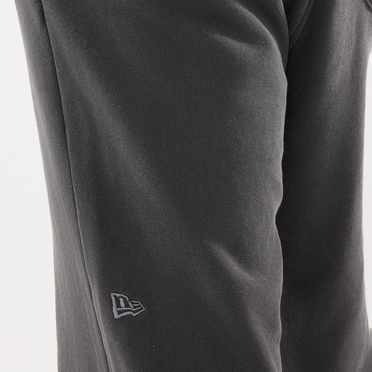 The model is wearing this New Era Originators Straight Leg Joggers in black. 4