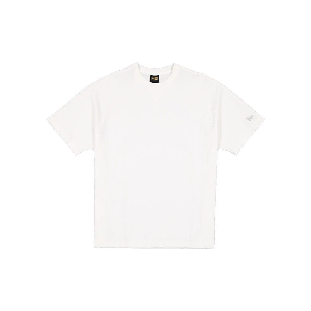 The model is wearing this New Era Black Label Seersucker T-Shirt in Cream. 1