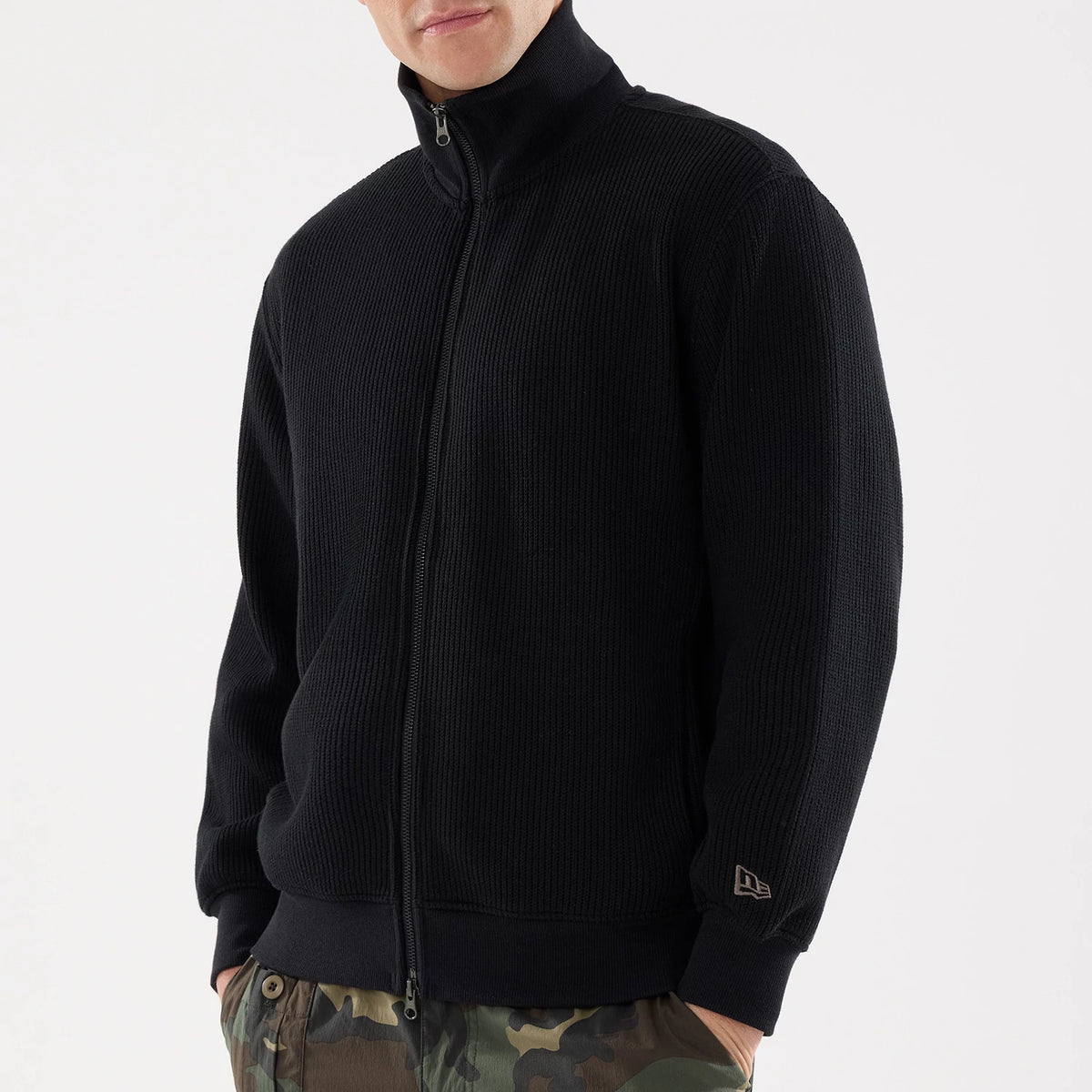 The model is wearing this New Era Black Label Jacket in black. 3