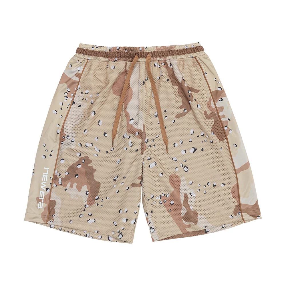 The model is wearing this New Era Bermuda Oversized Shorts in Woodland Camo. 7