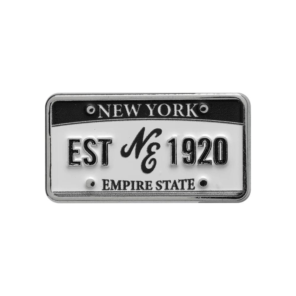 Pictured is this New Era License Plate Pinbadge in silver. 1