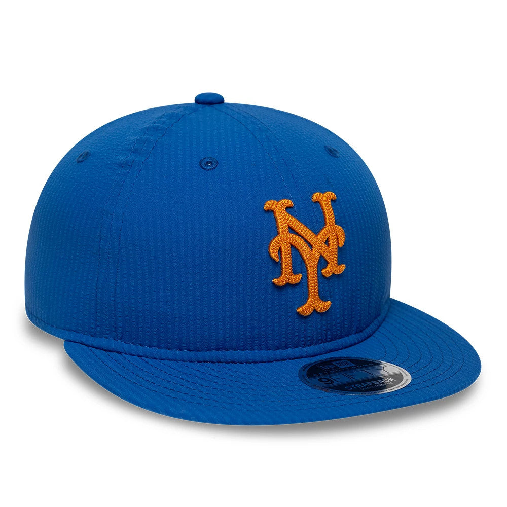 New York Mets MLB Seersucker Dark Blue Retro Crown New Era 9FIFTY Adjustable Cap, front view showing an orange Mets logo in raised embroidery on the structured crown, with a 9FIFTY size sticker on the flat blue visor.