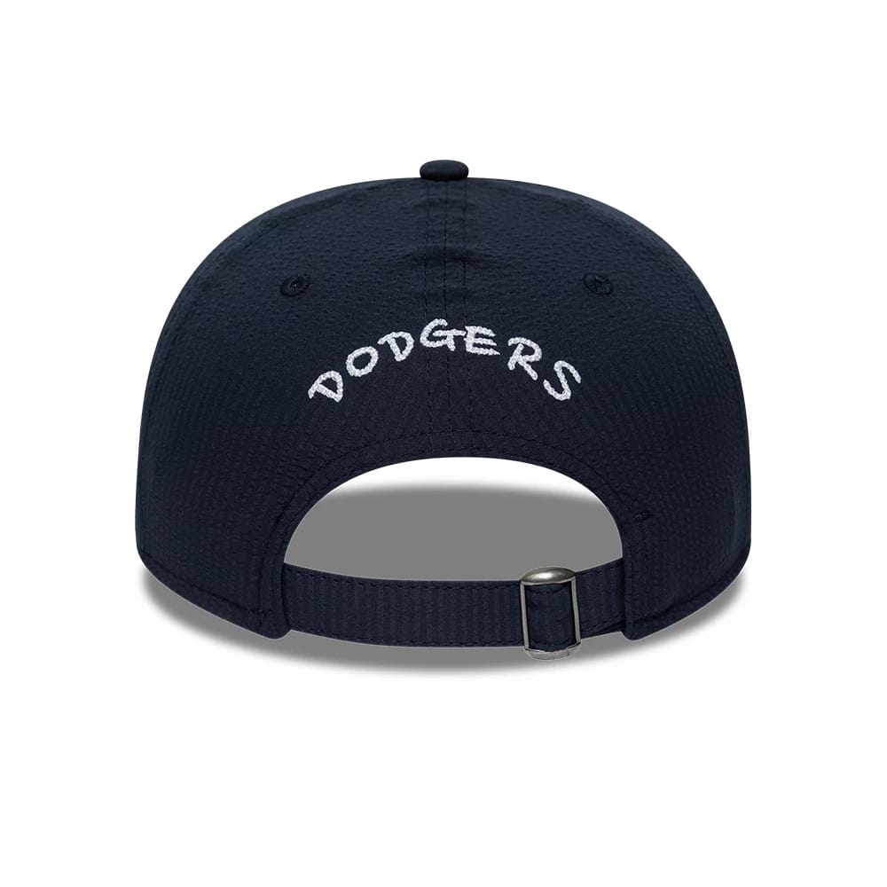 LA Dodgers MLB Seersucker Navy Retro Crown New Era 9FIFTY Adjustable Cap, rear view showing white Dodgers script centrally embroidered above the adjustable strap, highlighting the navy textured fabric and classic silhouette.