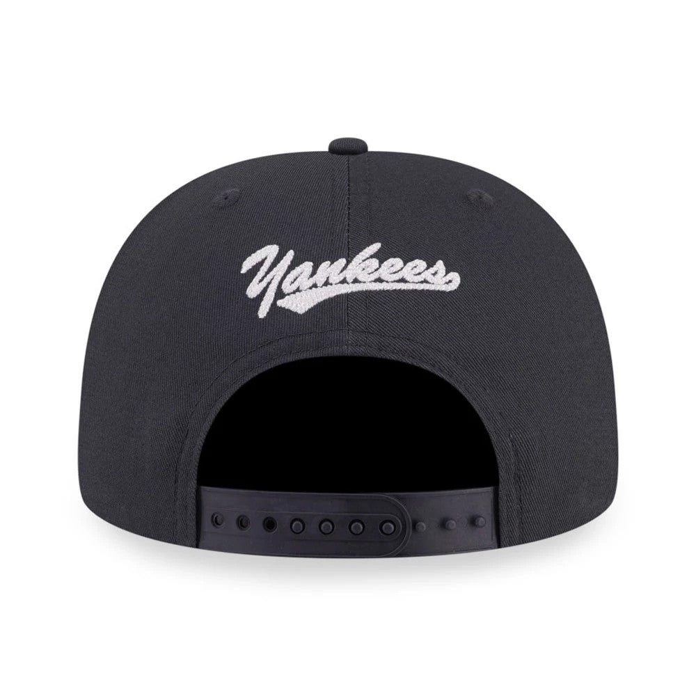 Pictured is this MLB Denim Patchwork New York Yankees 9FIFTY Snapback cap in black. 3