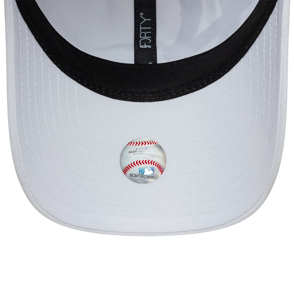 Pictured is this MLB Spray Paint New York Yankees 9FORTY cap in white. 7
