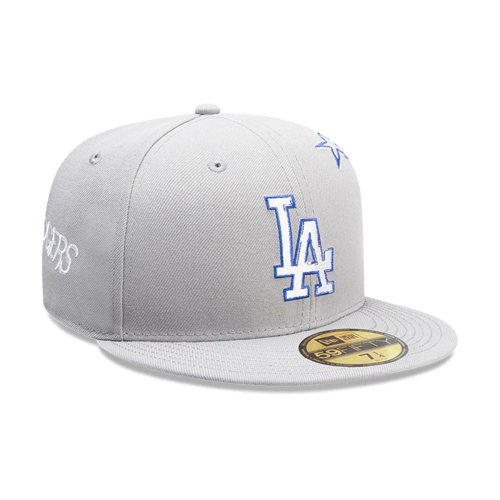 Los Angeles Dodgers MLB Punkcore Grey New Era 59FIFTY Fitted Cap, three-quarter view showing the blue embroidered LA logo on the front panel, white Dodgers script on the side, and gold 59FIFTY size sticker on the flat grey visor.