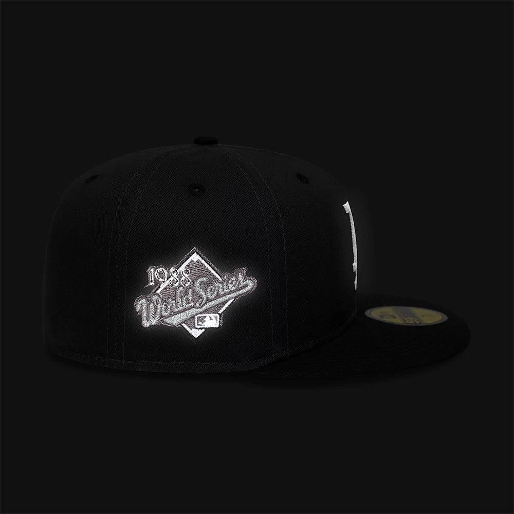 Pictured is this MLB Reflective LA Dodgers 59FIFTY Fitted cap in charcoal. 2