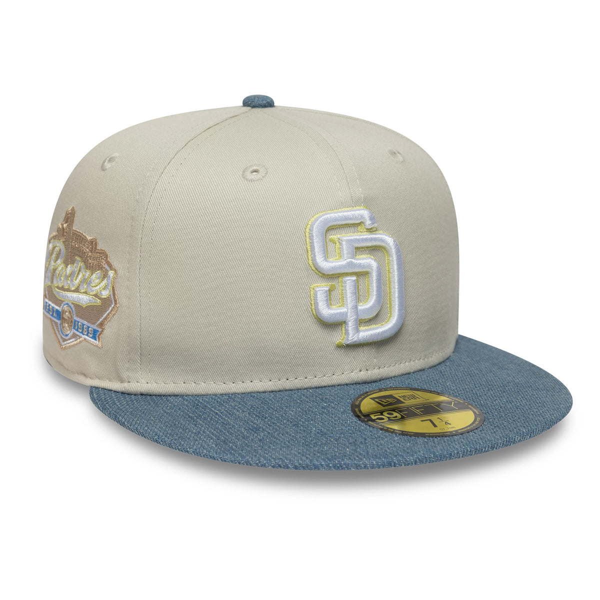 San Diego Padres MLB Denim Mix Beige New Era 59FIFTY Fitted Cap, front view showing white SD logo embroidery on the beige crown, blue denim visor with a gold 59FIFTY size sticker, and Padres graphic on the side.