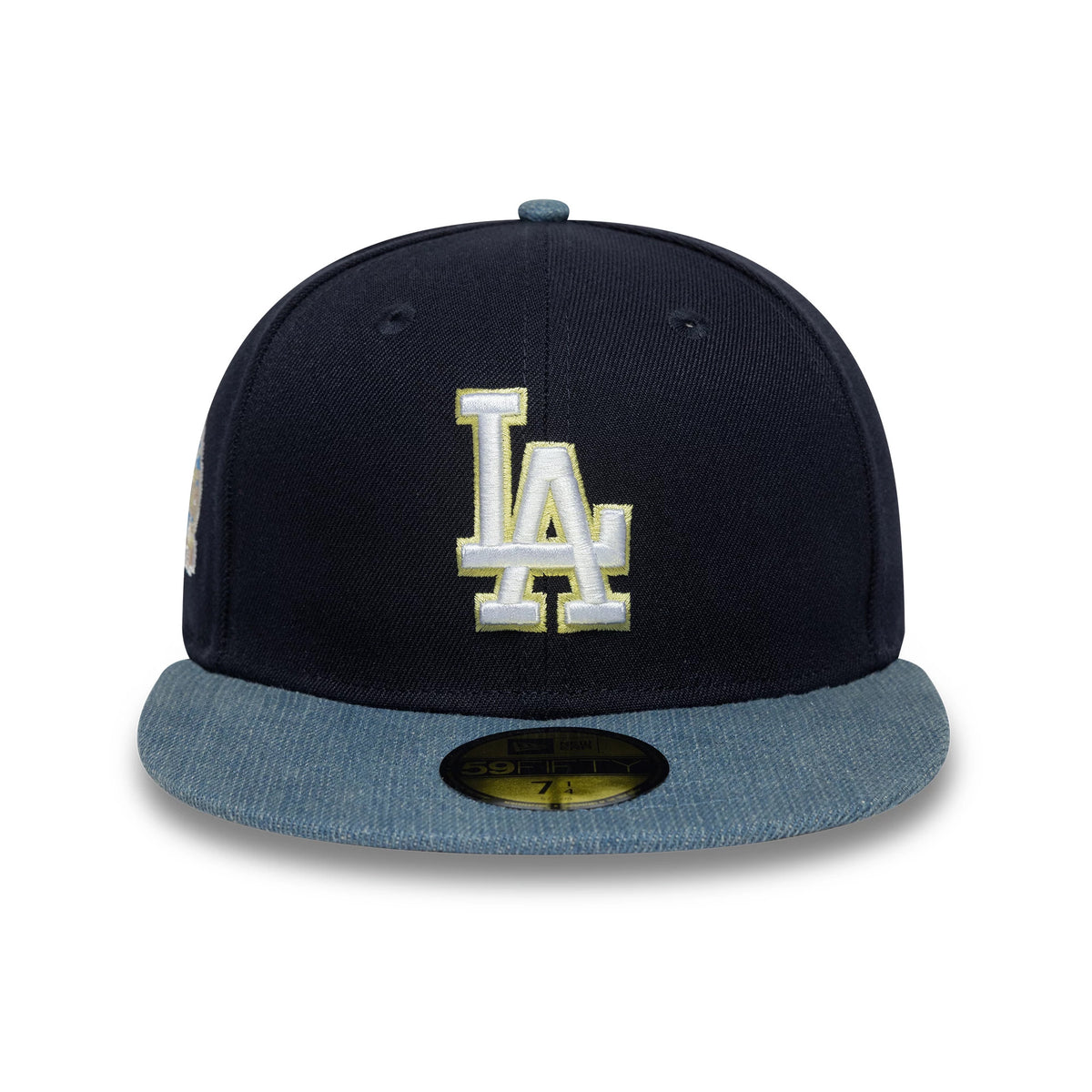 LA Dodgers MLB Denim Mix Navy New Era 59FIFTY Fitted Cap, front view showing raised white LA logo on the navy crown, denim visor with gold 59FIFTY size sticker, and navy top button and eyelets.