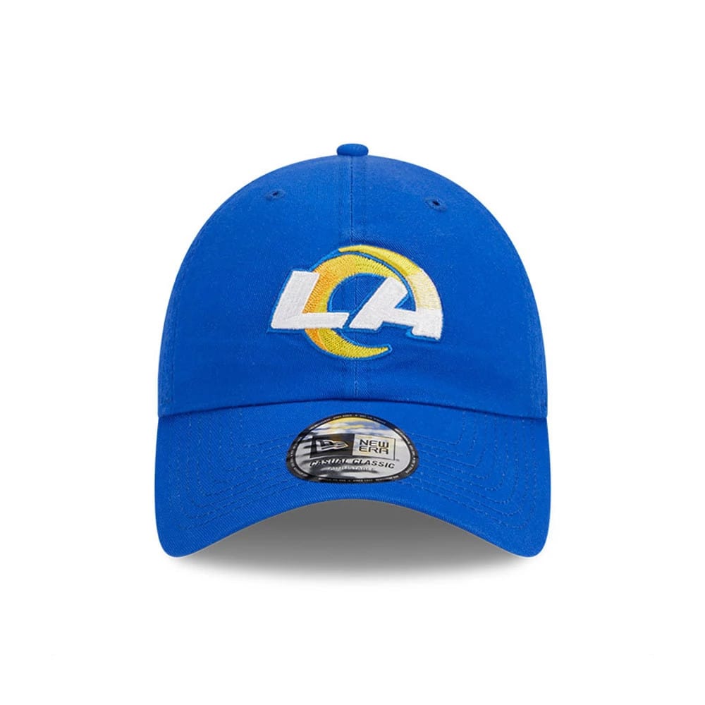 LA Rams NFL X Bad Bunny Bright Blue New Era Casual Classic Adjustable Cap, front view showing the white and yellow embroidered LA logo on the structured crown, with an adjustable strap and the Casual Classic size sticker on the curved visor.