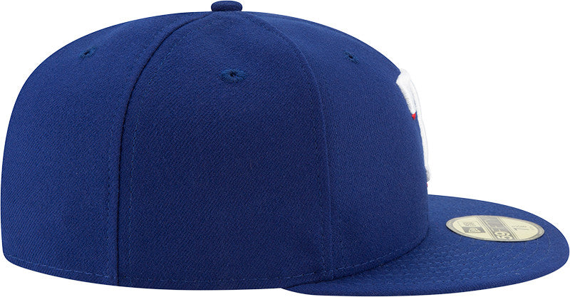 MLB Authentic On Field Texas Rangers Blue New Era 59FIFTY Fitted Cap, side view showing the structured blue crown and slightly curved visor with a gold 59FIFTY size sticker on top, eyelets on each panel.