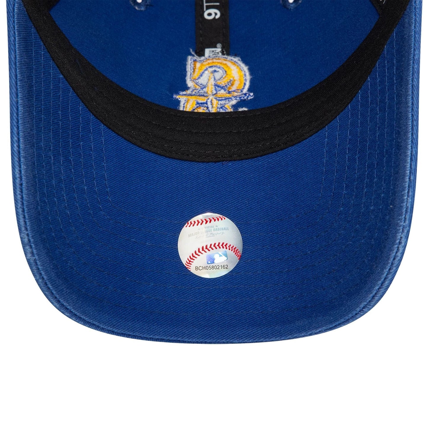 Seattle Mariners MLB Core Classic Blue New Era 9TWENTY Adjustable Cap, inside view showing the black sweatband, a printed logo on the blue undervisor, and a baseball hologram sticker with MLB authentication.
