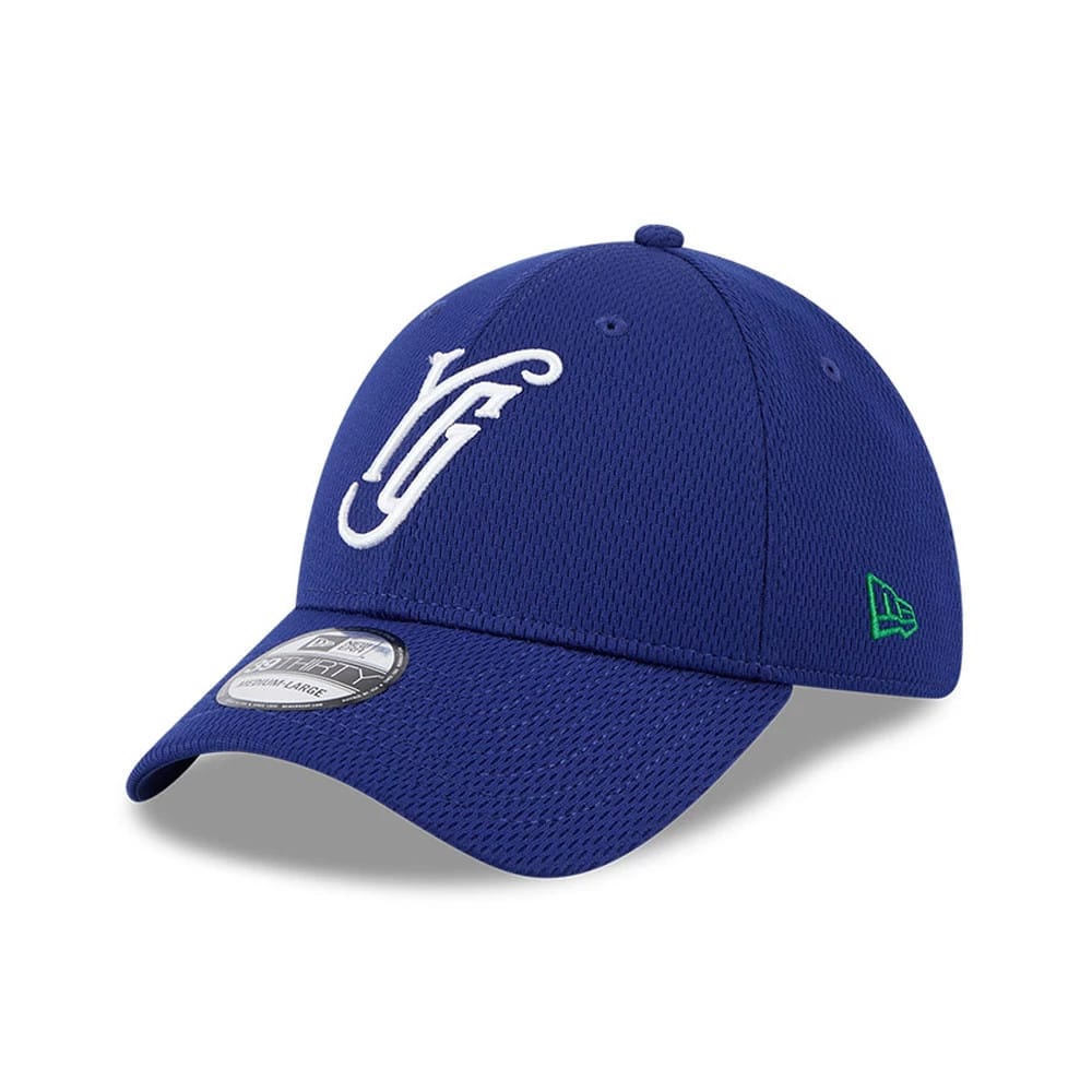 Yard Goats MiLB Batting Practice Dark Blue New Era 39THIRTY Stretch Fit Cap, three-quarter view showing the raised white team logo on the front panel, dark blue visor with the 39THIRTY size sticker, and green New Era flag logo on the left side.