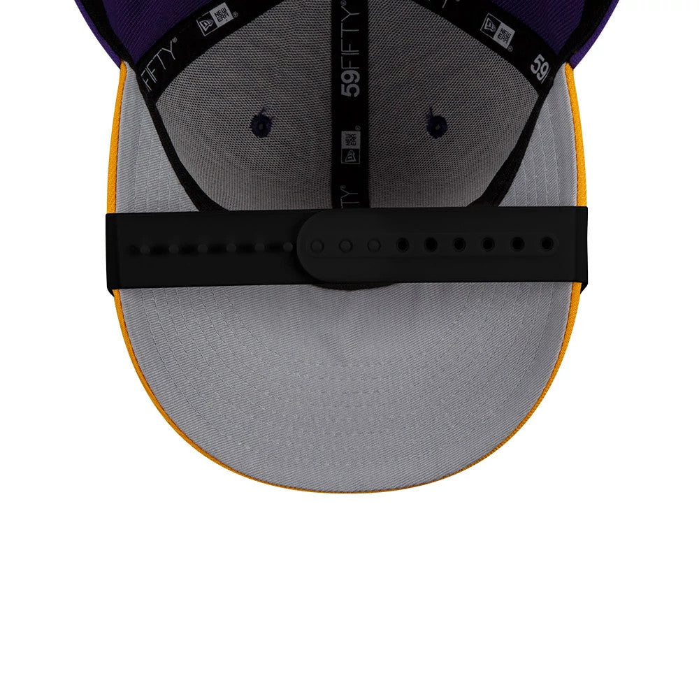 New Era Black Visor Curver, inside view showing the grey undervisor with black taping inscribed with 59FIFTY, purple interior panels with matching embroidered eyelets, and a black snapback closure.