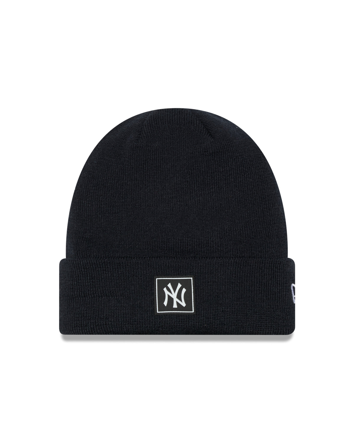 New York Yankees Team Black Beanie Hat, front view showing the white NY logo in a square patch on the folded cuff, with a seamless black knit design and the New Era flag logo on the side.