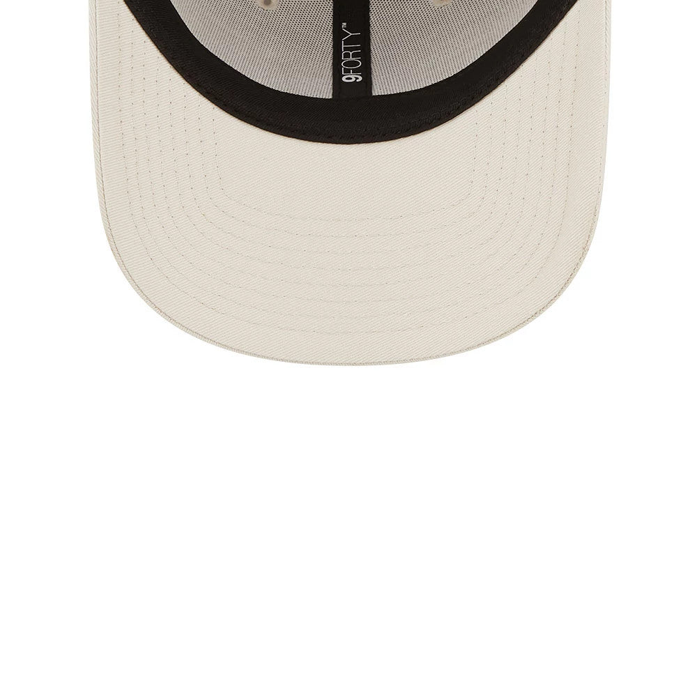 LA Dodgers League Essential Stone New Era 9FORTY Adjustable Cap, inside view showing black taping with a 9FORTY logo, a black sweatband lining the interior, and a light stone undervisor highlighting the cap's craftsmanship.