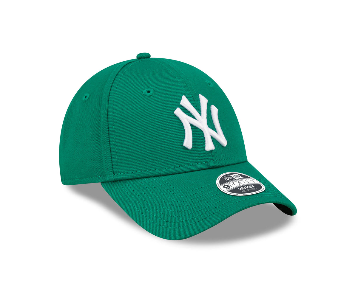 New York Yankees Womens League Essential Green New Era 9FORTY Adjustable Cap, three-quarter view with a white raised embroidered NY logo on the structured front panel, a matching green visor, and a 9FORTY size sticker on top.